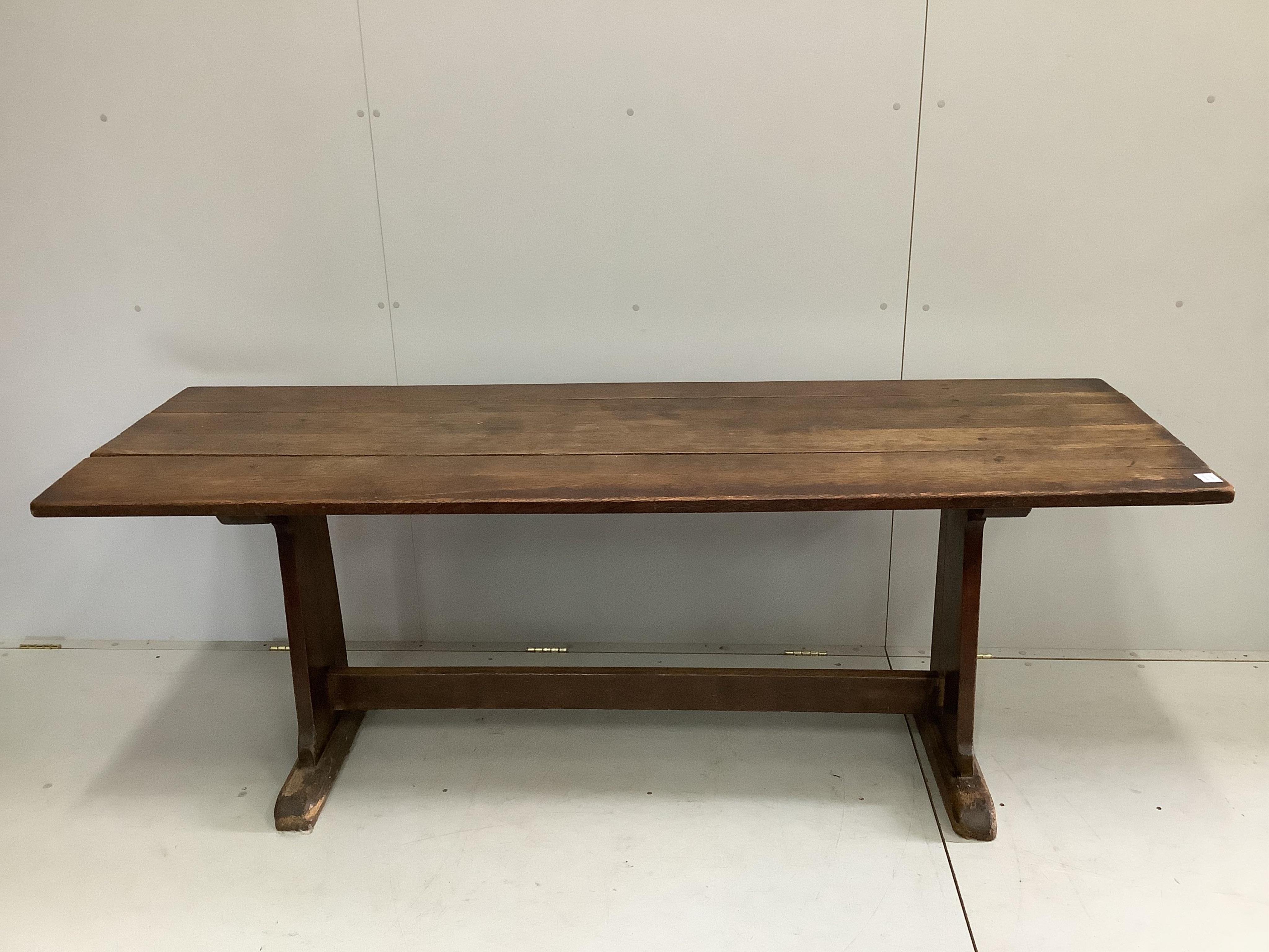 An 18th century and later rectangular oak tavern table, width 205cm, depth 69cm, height 76cm. Condition - fair